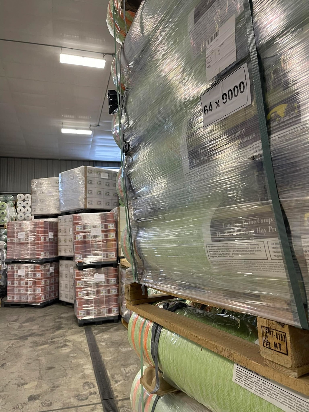 Pallets of net wrap and twine stocked in The Fine Twine Co. warehouse